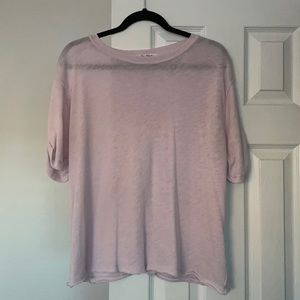 Lavender colored Free People shirt.